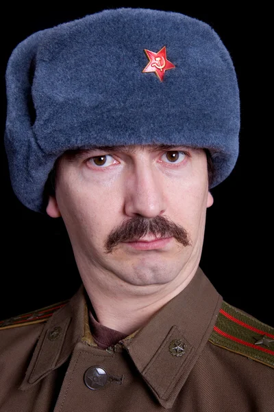 Νεαρός άνδρας, ντυμένος ως Ρώσοι στρατιωτικοί — Φωτογραφία Αρχείου