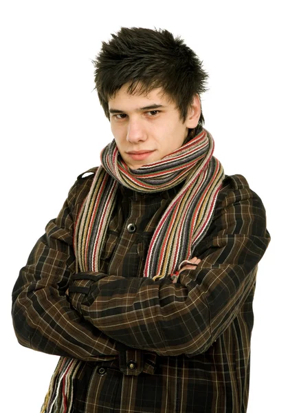 Genç bir adam stüdyo resmi kış için giyinmiş — Stok fotoğraf