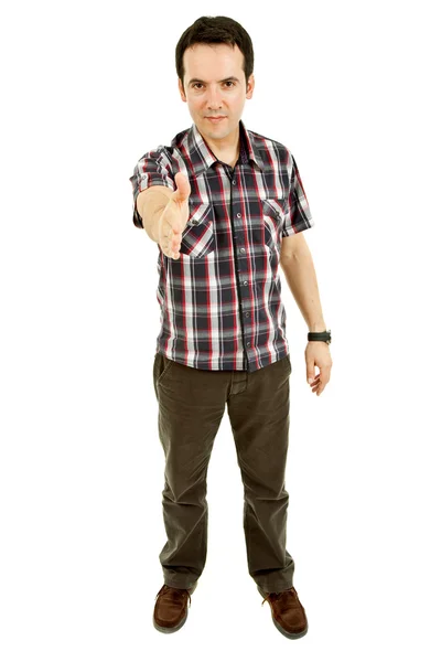 Young casual man offering to shake the hand — Stock Photo, Image