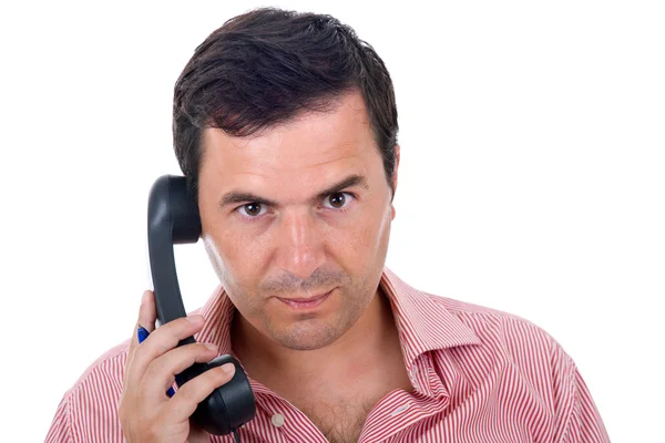 Νεαρός άνδρας με ένα τηλέφωνο, που απομονώνονται σε λευκό — Φωτογραφία Αρχείου