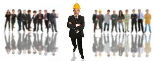 Mature business man in front of a group of — Stock Photo, Image