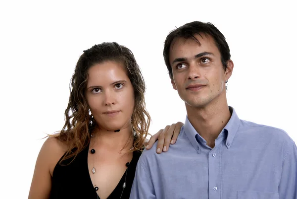Young happy couple in a studio portrait — Stock Photo, Image