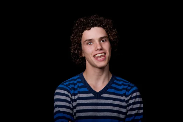 Young happy man portrait, on a black background — Stock Photo, Image