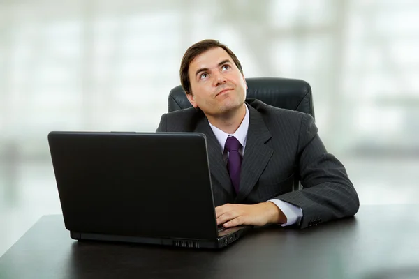 Young business man working with is laptop — Stock Photo, Image