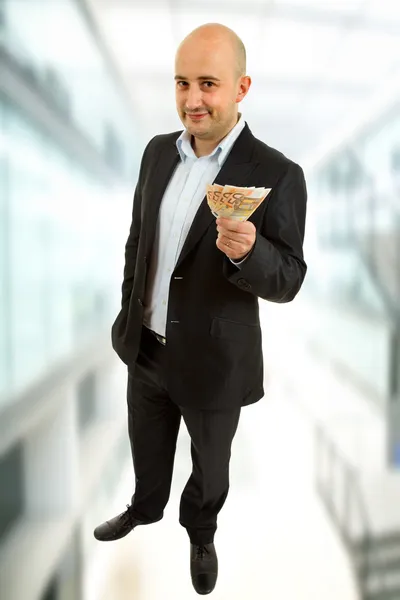 Young business man with money — Stock Photo, Image