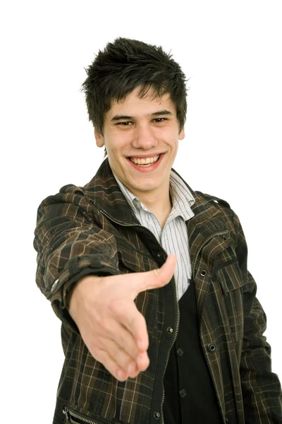 Young casual man offering to shake the hand — Stock Photo, Image