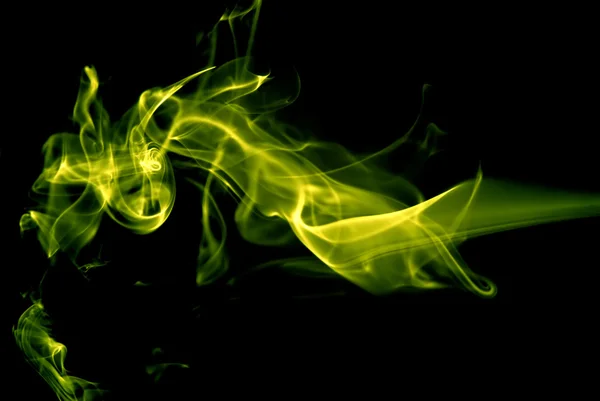 Abstract colored smoke in a black background — Stock Photo, Image