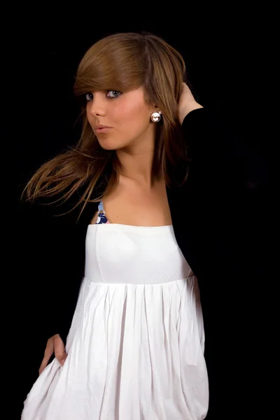 Young beautiful girl portrait against black background — Stock Photo, Image