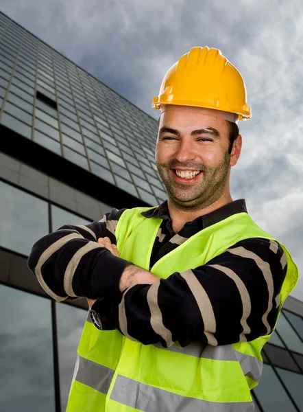 Young happy worker portrait with arms crossed — Stock Photo, Image