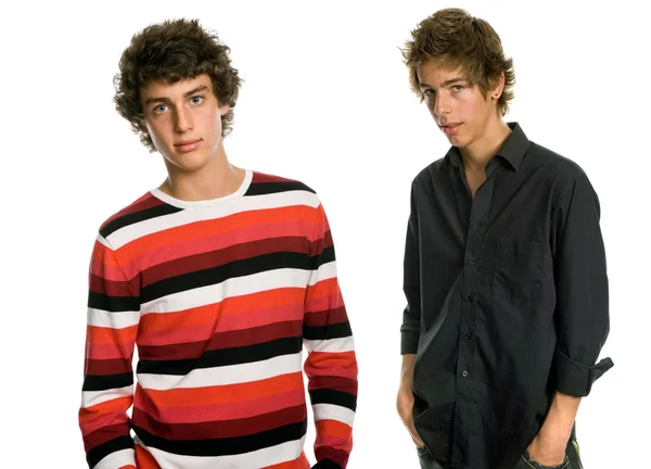 Two young men standing, on a white background — Stock Photo, Image