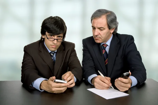 Business team working at a desk at the office — Stock Photo, Image