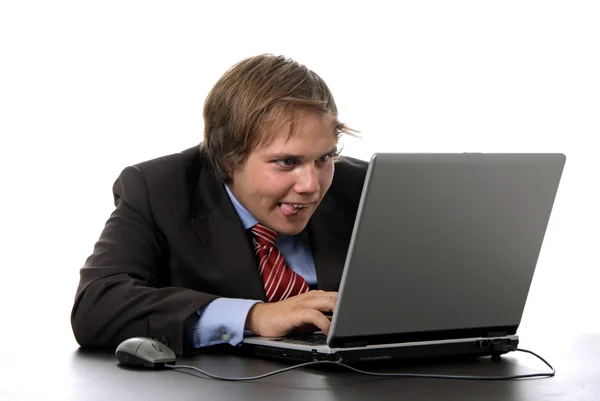 Молодой человек и работа с ноутбуком Стоковая Картинка