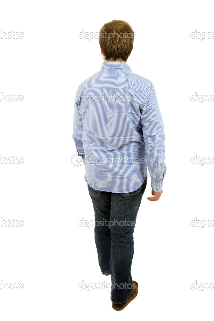 Young casual man full body in a white background