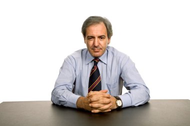 Masa üzerinde olgun iş adamı,