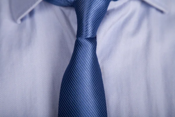 Detalhe de um terno de homem de negócios com gravata azul — Fotografia de Stock