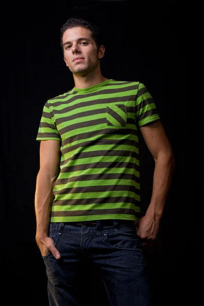 Young man portrait, on a black background — Stock Photo, Image