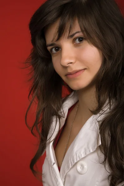 Young woman portrait isolated on red background — Stock Photo, Image