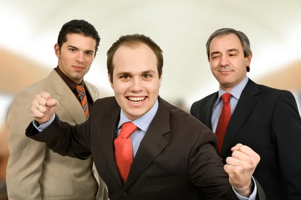 Three happy business men at the office — Stock Photo, Image