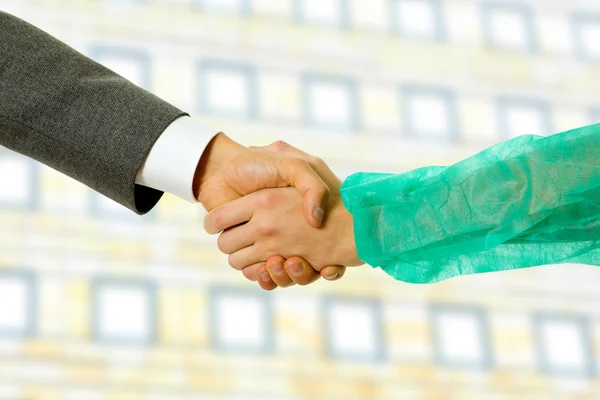 Business men and doctor hand shake, close up — Stock Photo, Image