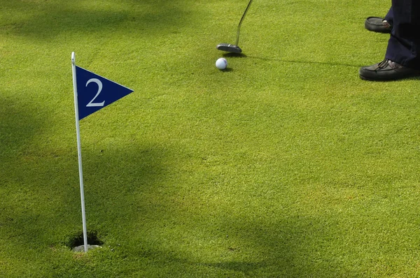 A small detail of a man playing golf — Stock Photo, Image