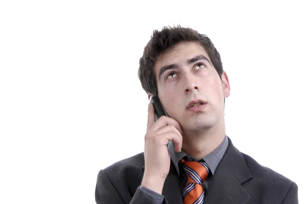 Jeune homme au téléphone en fond blanc — Photo