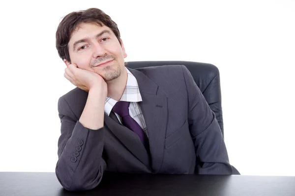 Young business man on a desk, isolated on white — Stock Photo, Image