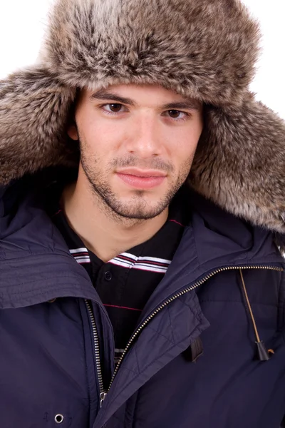 Студійне зображення молодого чоловіка, одягненого на зиму — стокове фото