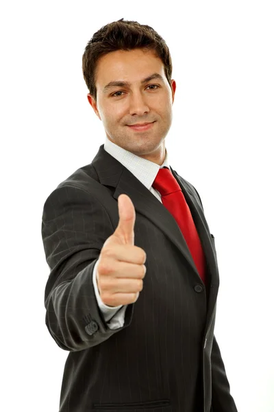 Молодой бизнесмен поднимает большой палец — стоковое фото