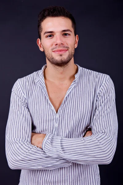 Young casual man portrait on a black background — Stock Photo, Image