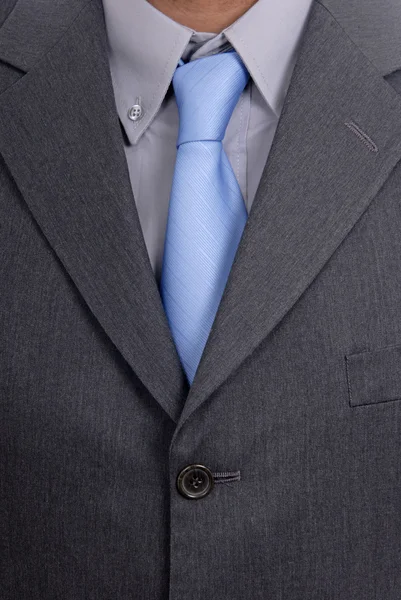 Detalle de un traje de hombre de negocios con corbata azul — Foto de Stock