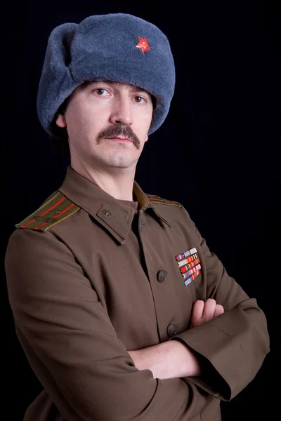 Young man dressed as russian military, studio — Stock Photo, Image