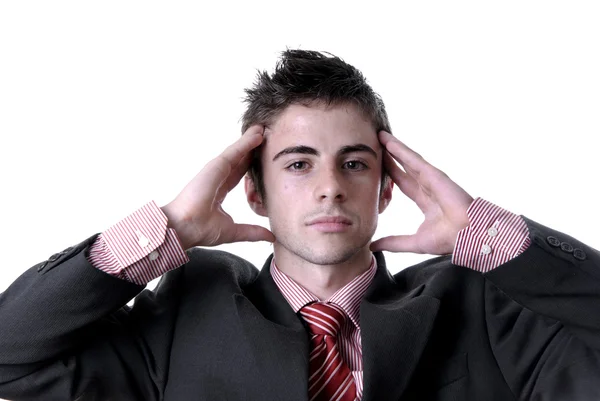 Businessman in a suit gestures with a headach — Stock Photo, Image