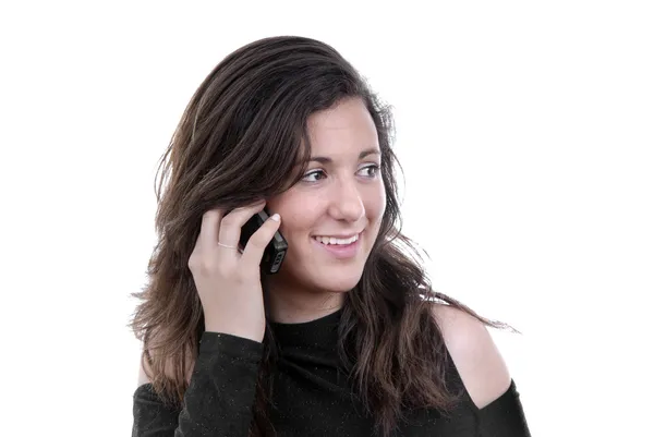 Young woman speaking on the mobile phone — Stock Photo, Image