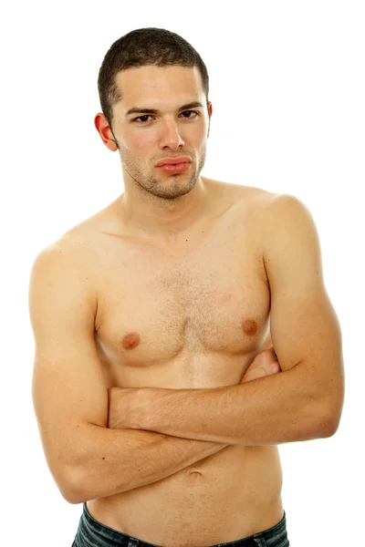Giovane uomo sensuale su uno sfondo bianco — Foto Stock
