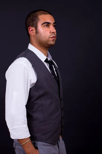 Pensive business man portrait on black background — Stock Photo, Image