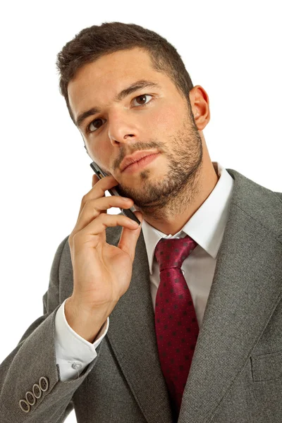 Junger Geschäftsmann am Telefon, isoliert — Stockfoto