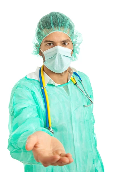 Young male doctor offering hand, focus on the face — Stock Photo, Image