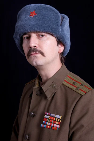 Young man dressed as russian military, studio — Stock Photo, Image