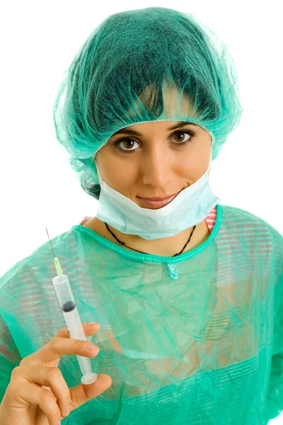 Young woman nurse portrait with a syringe — Stock Photo, Image