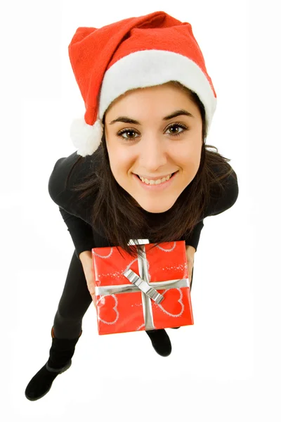 Beautiful young girl holding a christmas gift, isolated Stock Photo