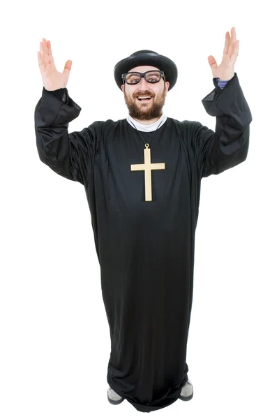 Young man dressed as priest, full length, isolated on white Royalty Free Stock Images