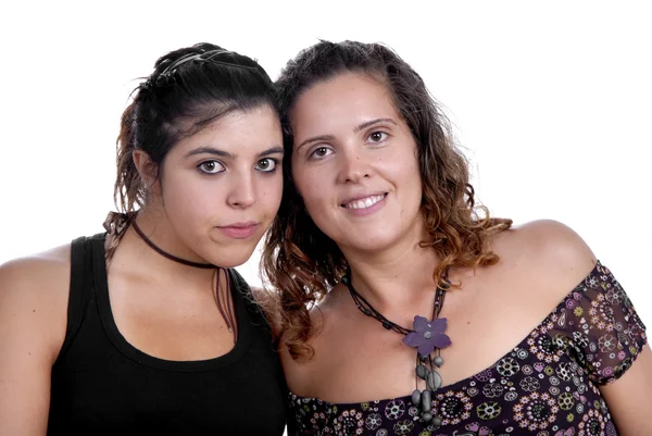 Две молодые случайные женщины, изолированные на белом — стоковое фото