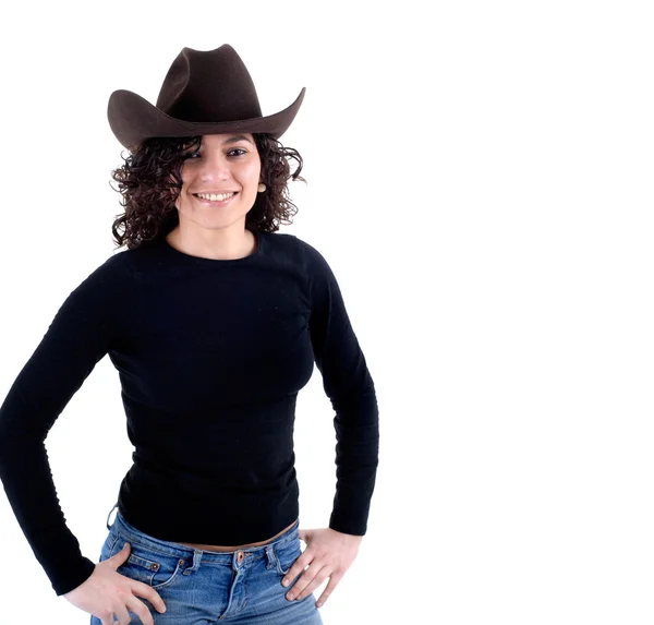 Ganska cowgirl med en hatt — Stockfoto