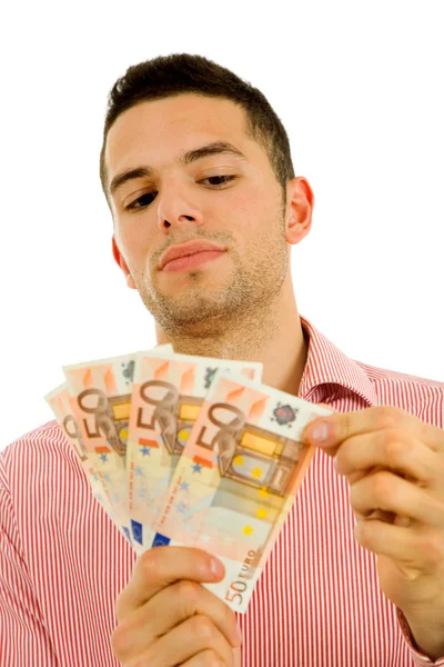 Young casual man with lots of money — Stock Photo, Image
