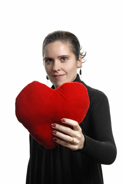 Pretty young woman holding a Valentines heart — Stock Photo, Image