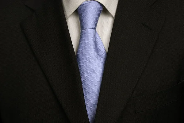 Detalle de un traje de hombre de negocios con corbata azul — Foto de Stock