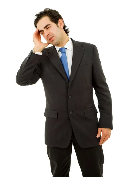 Бизнесмен в костюме жестикулирует с головной болью — стоковое фото