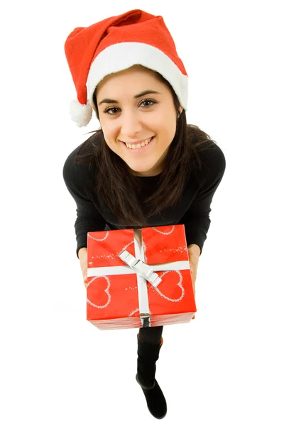 Beautiful young girl holding a christmas gift, isolated Stock Photo