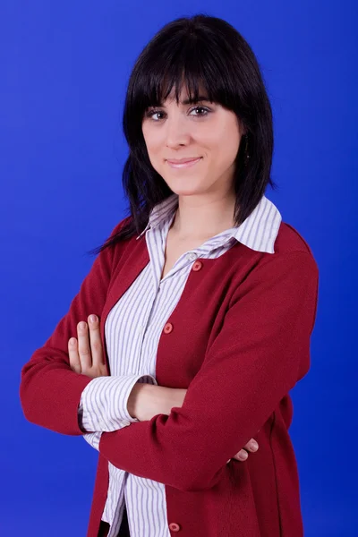 Young beautiful woman, on a blue background — Stock Photo, Image