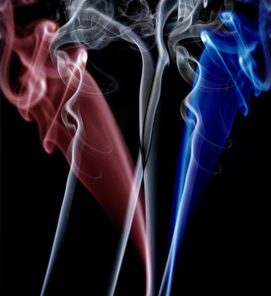 Abstract colored smoke in a black background — Stock Photo, Image